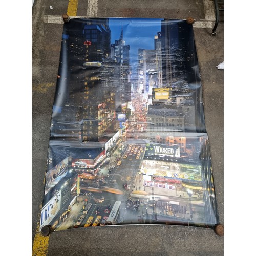 836 - A super large unframed rolled print showing a view of a bustling New York lit up at night. 
MM: L182... 