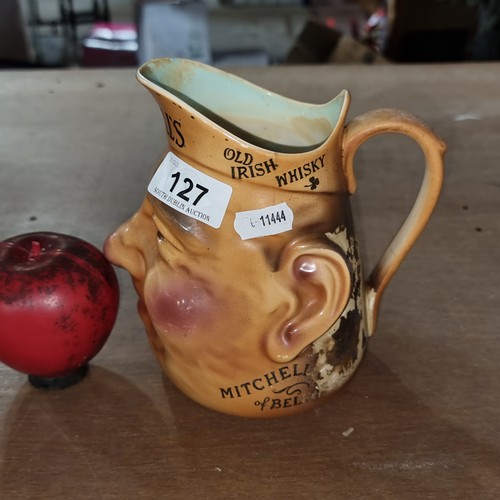 127 - A rare 1930s Mitchell’s & Co Belfast Irish whisky character jug.