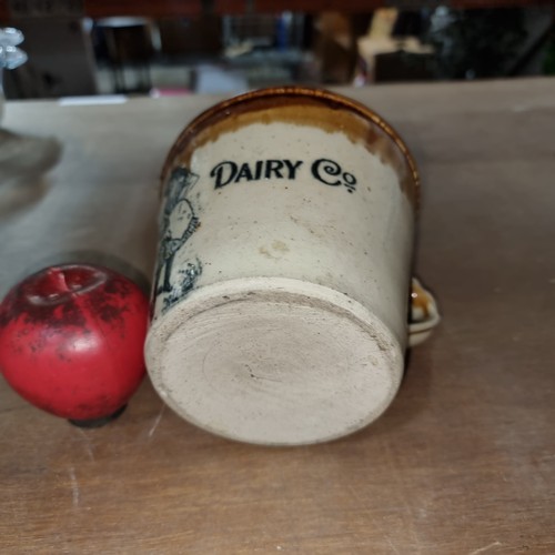 138 - A rare Danish Dairy Co. Stoneware butter jug. The company was a manufacture in Edinburgh and had man... 