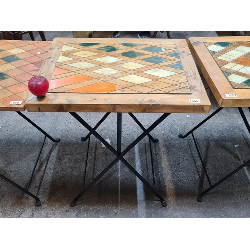 1009 - A chic fold out breakfast table with a fabulous stained top in a geometric pattern in shades of gree... 