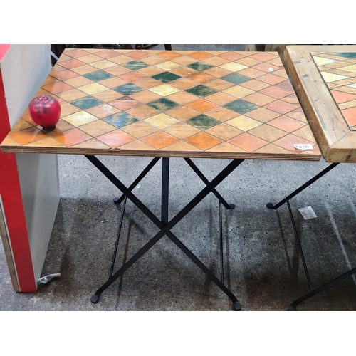 1010 - A stylish fold out breakfast table with a fabulous stained top in a geometric pattern in shades of g... 