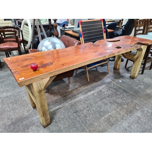 1021 - Star Lot : A gorgeous and heavy live edge wooden table with lovely natural graining and figure to to... 