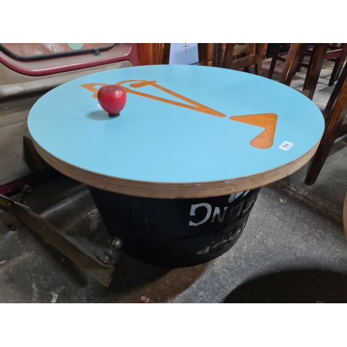 994 - An attractive coffee/pub table crafted from a reclaimed Teeling barrel to base with a vibrant round ... 