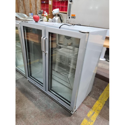 1022 - Star Lot : A commercial back bar cooler / fridge model BB2 250H with two doors to front and two shel... 