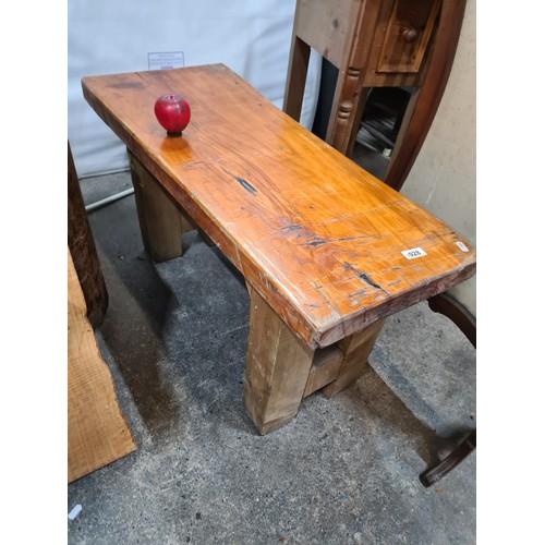 1028 - Star Lot : An attractive live-edge wood bench with wooden supports. Commercial quality from a recent... 