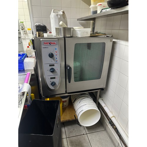 1042 - Star Lot : A Good Rational stainless steel commercial gas oven on a Stainless Steel stand. Fully wor... 