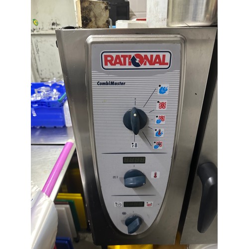 1042 - Star Lot : A Good Rational stainless steel commercial gas oven on a Stainless Steel stand. Fully wor... 