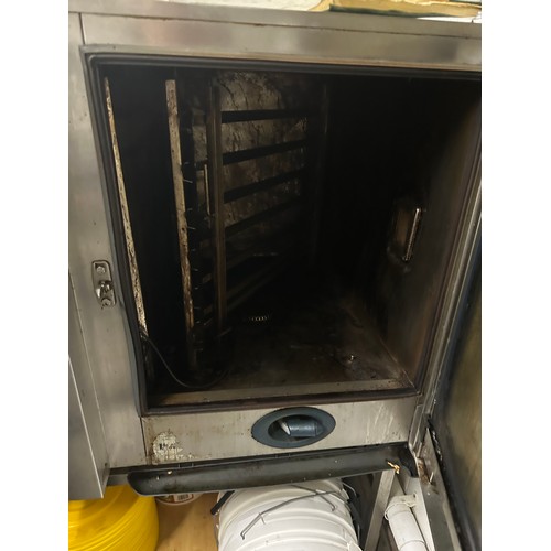 1042 - Star Lot : A Good Rational stainless steel commercial gas oven on a Stainless Steel stand. Fully wor... 