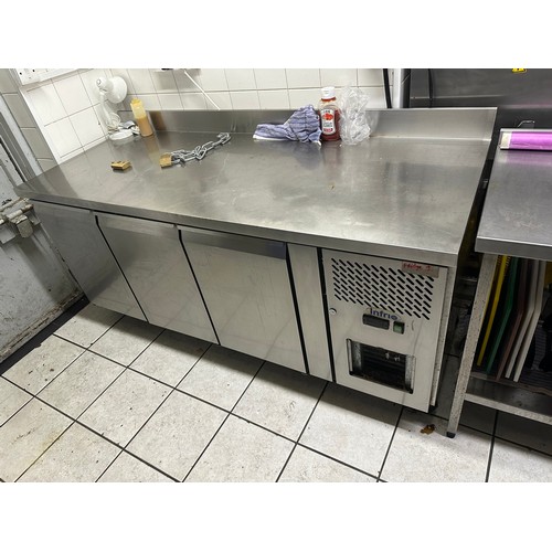 1045 - Star Lot : A good triple fridge with Stainless Steel prep top and gallery back .  Fully working from... 