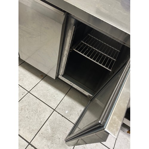 1045 - Star Lot : A good triple fridge with Stainless Steel prep top and gallery back .  Fully working from... 