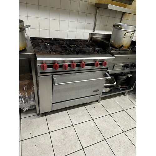 1047 - Star Lot : Star Lot : A good 6 ring gas cooker in Stainless Steel by DCS.  Fully working from a Bar,... 