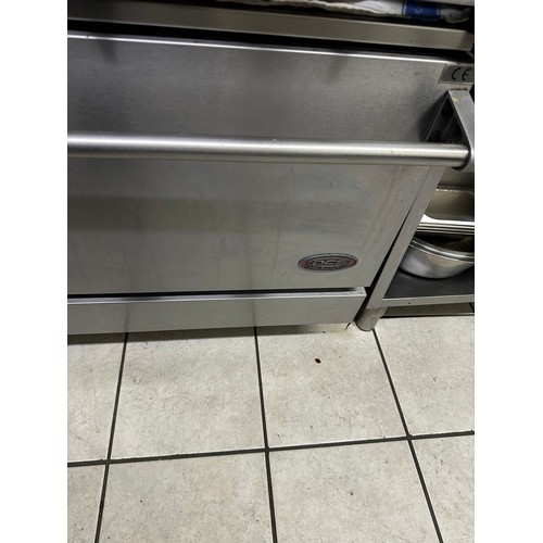 1047 - Star Lot : Star Lot : A good 6 ring gas cooker in Stainless Steel by DCS.  Fully working from a Bar,... 