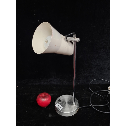 194 - A stylish vintage mid century chrome base table lamp complete with three pin plug.