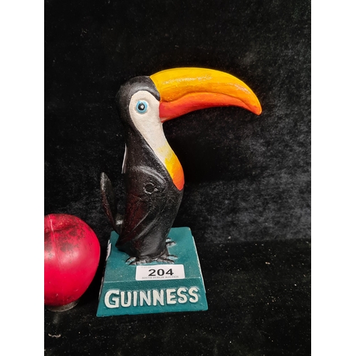 204 - A charming cast metal Guinness advertising figure of the iconic toucan.