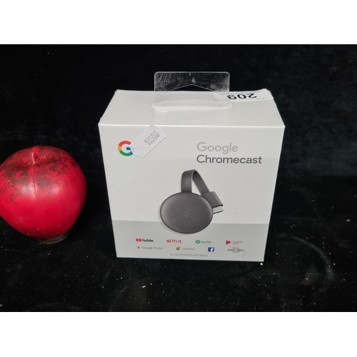 209 - A brand new sealed Google Chromecast.