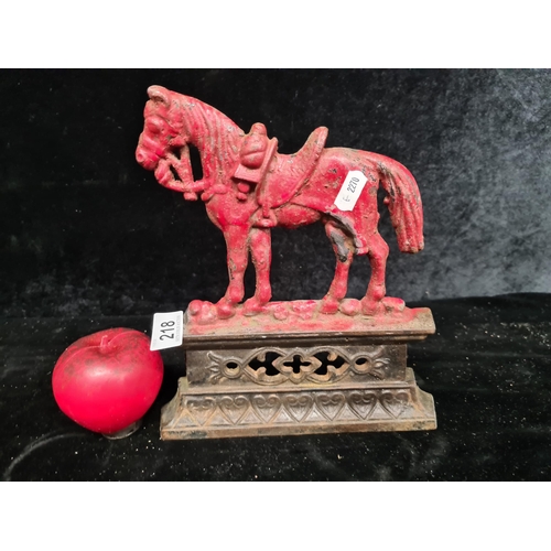 218 - An original antique heavy cast metal flatback Door stop in the form of a horse.