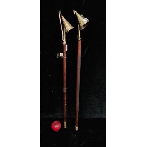 238 - Two wonderful antique long ecclesiastical candle snuffers with brass heads and wooden handles. L82cm... 