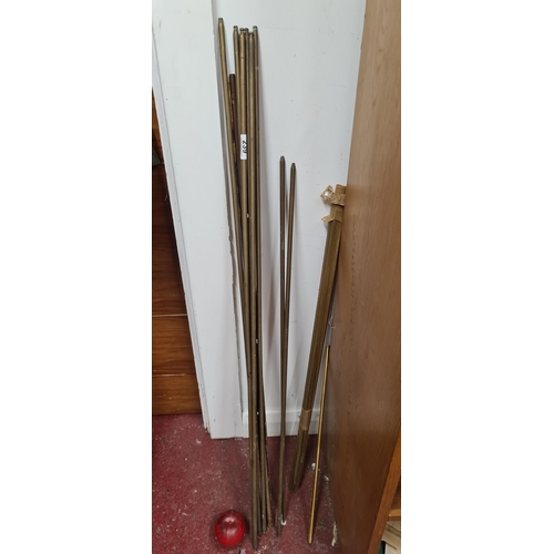 239 - A collection of Victorian solid brass stair rods.These are solid brass and very heavy.