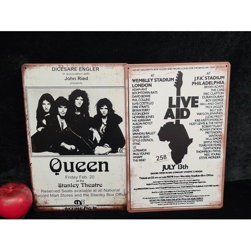 258 - Two metal wall signs advertising Queen and Live Aid concerts.