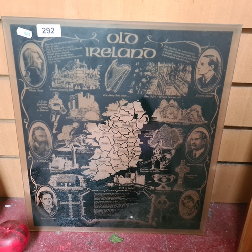 292 - A reverse printed glass pane featuring images of 'Old Ireland' culture.