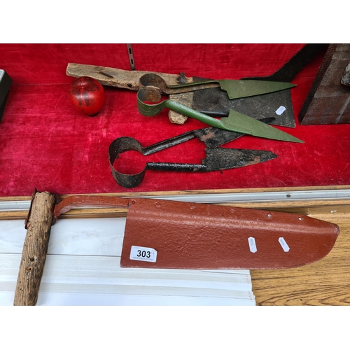 303 - Four antique and vintage agricultural tools including shears, turf cutter and more.