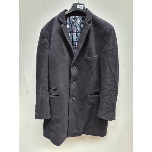 322 - A handsome woolen coat by Ben Sherman, expertly tailored with a flashy graphic lining. Mens size 44R... 