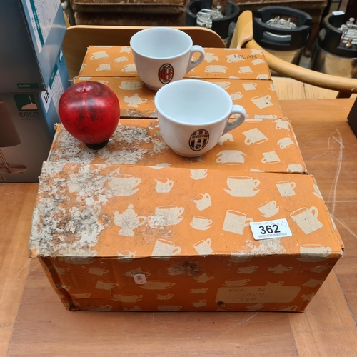 362 - Two boxes containing 12 Inker Porcelain teacups each, featuring crests of Juventus and AC Milan foot... 