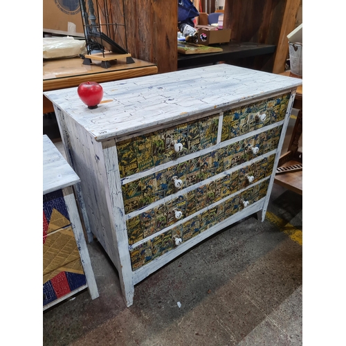 399 - A stylish upcycled bedroom chest of drawers featuring DC Comic decay throughout and boasting five pu... 