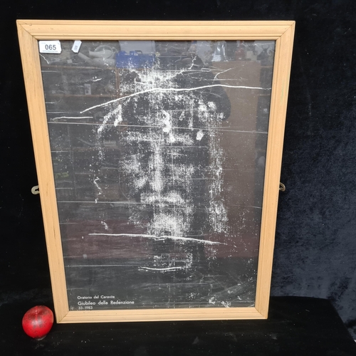 65 - A large enticing print showing the Shroud of Turin, reading 