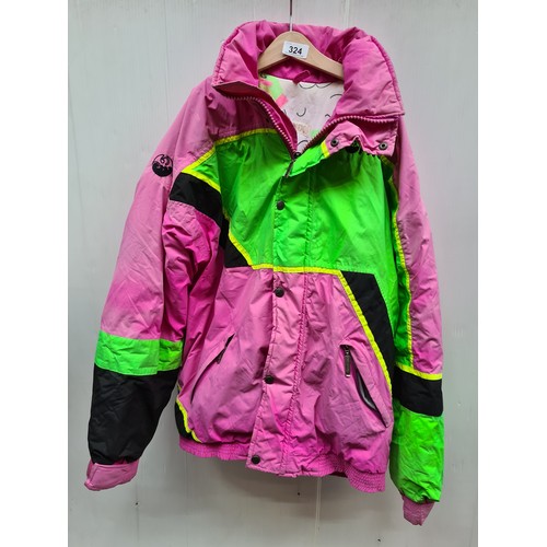 324 - A super retro 80s Phoenix branded women's ski jacket in a bright pink and green colourway. Crafted w... 