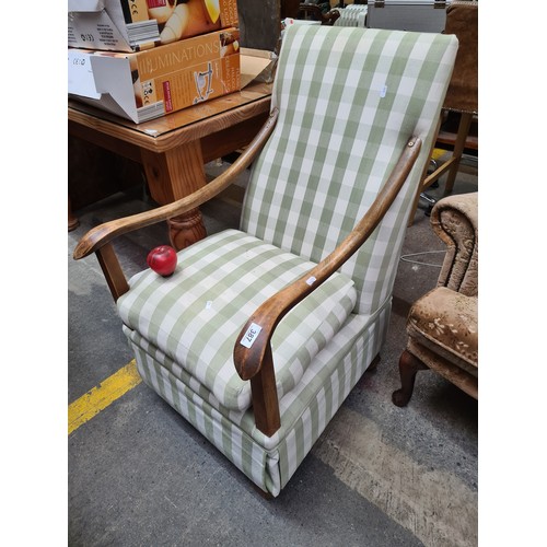 387 - A beautiful farmhouse style sprung rocking armchair with solid oak wood frame and sage green cotton ... 