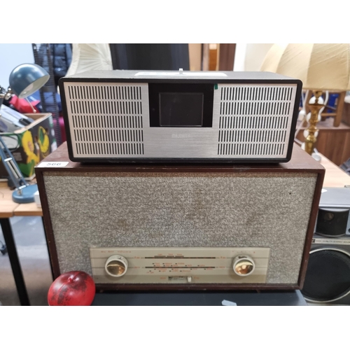 566 - Two items including a vintage tube radio along with a Majority branded AM/FM radio.