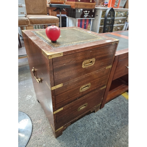 576 - Star lot : A vintage Campaign style three drawers stationery cabinet with brass integrated handles, ... 