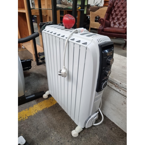 584 - A Delonghi dragon portable oil filled storage heater. I like these, always feel these are safer than... 