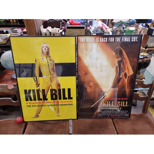 586 - Two large Kill Bill framed movie posters. Would make a great addition to any man or lady cave.