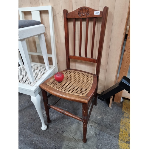 587 - A gorgeous 1940's spindle back bedside chair with a rattan seat.