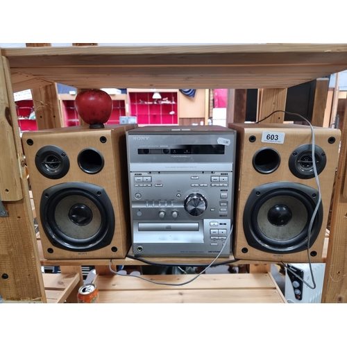 603 - A SONY CMT-CP2WA compact stereo HiFi system with speakers. Features tape deck and CD player.