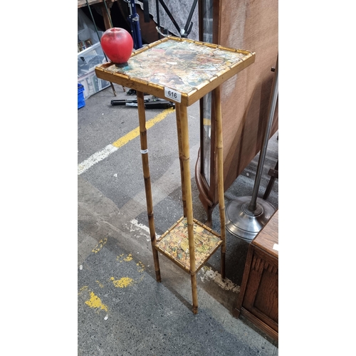 616 - A beautiful vintage bamboo plant stand with a decoupage finish.