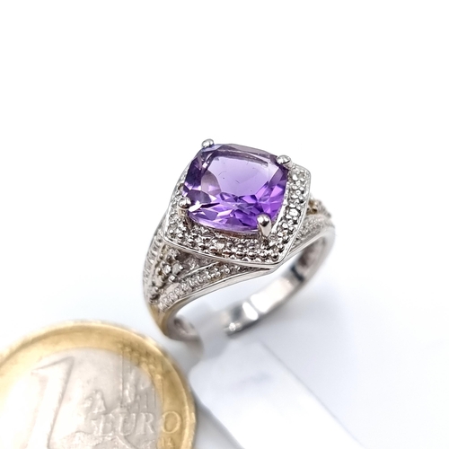 678 - A fine example of an amethyst gemstone gem set ring set in sterling silver, size O, weight 5.36 gram... 