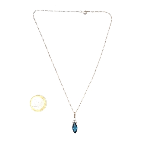 688 - A vintage Sterling Silver blue topaz gemstone pendant necklace and chain, length of chain 40cm.