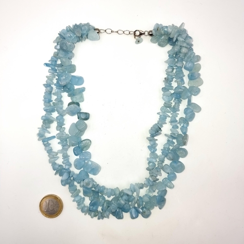 701 - A three row blue quartz necklace, length 42cm, weight 136 grams, stones cold to touch.