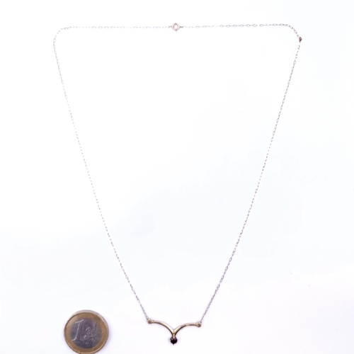 704 - Star Lot : A very pretty 9k gold garnet set pendant necklace, length of chain 46cm.