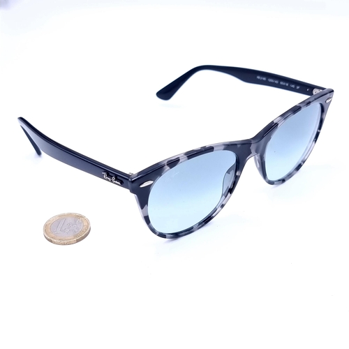 736 - A pair of as new RayBan luxottica evolve sunglasses with booklet, never worn.