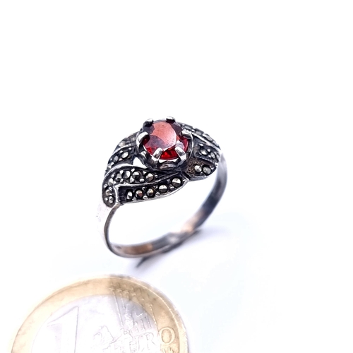 739 - A nice example of an art deco  garnet stone vintage sterling silver ring with a twist set marcasite ... 