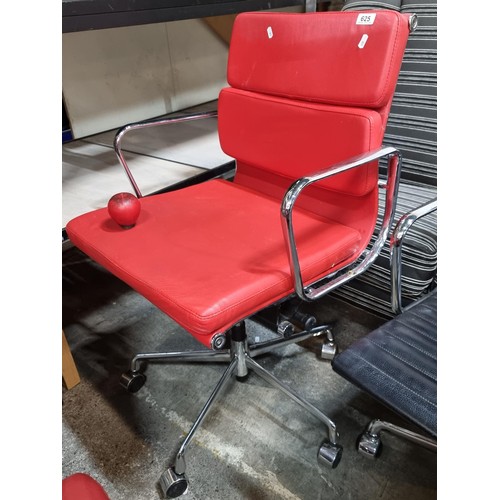 625 - Star Lot : A Charles Eames style soft pad striking red leather swivel chair with chrome frame. In ni... 