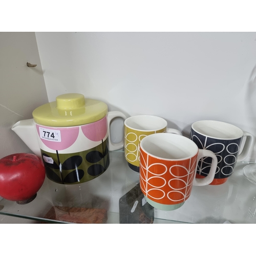 774 - A pretty Orla Kiely tea set comprising of 3 mugs and a teapot. In colourful floral design. In very g... 