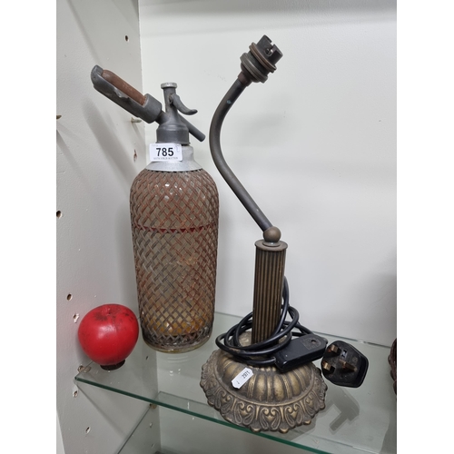 785 - Two items comprising of a vintage soda syphon and a beautiful brass base table lamp.