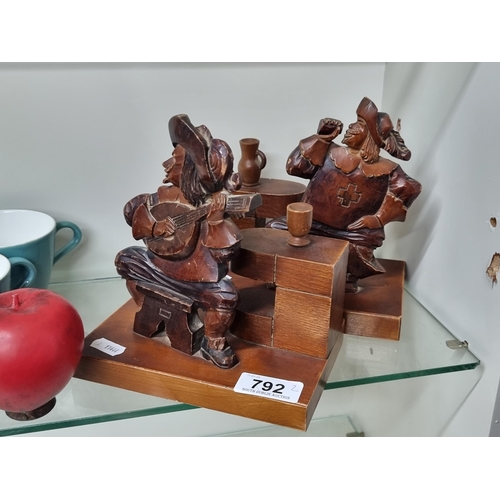 792 - A charming pair of characterful wooden bookends.