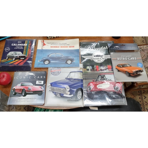 798 - A collection of six classic car enthusiast calendars and a vintage Morris Minor 1000 foldout adverti... 