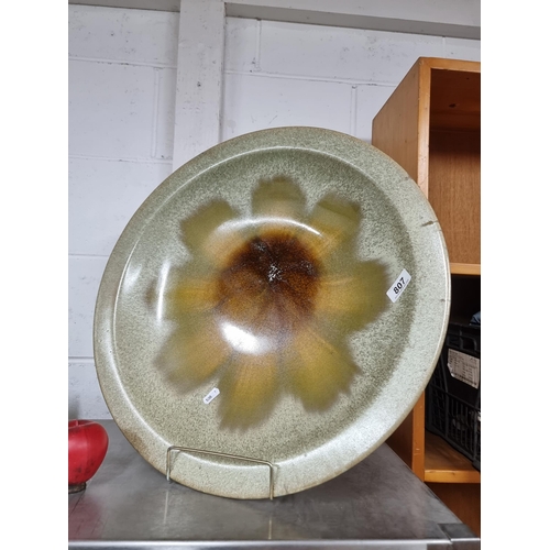 807 - A stunning large glazed art studio pottery stoneware centre piece bowl. Features a sunflower design ... 